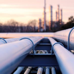 Oil and Gas Pipelines steel long pipes in crude oil factory during sunset 292x292